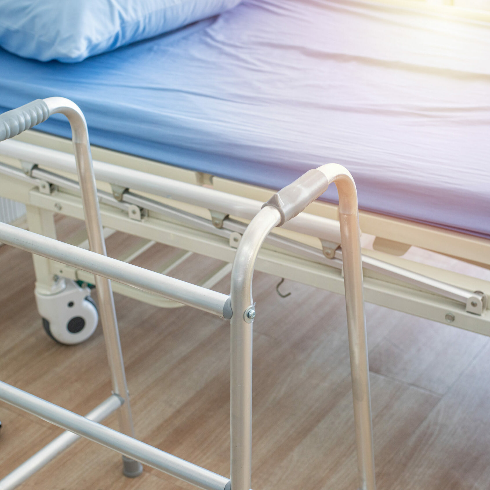 crutches,bed and mobility aids in ward of hospital.