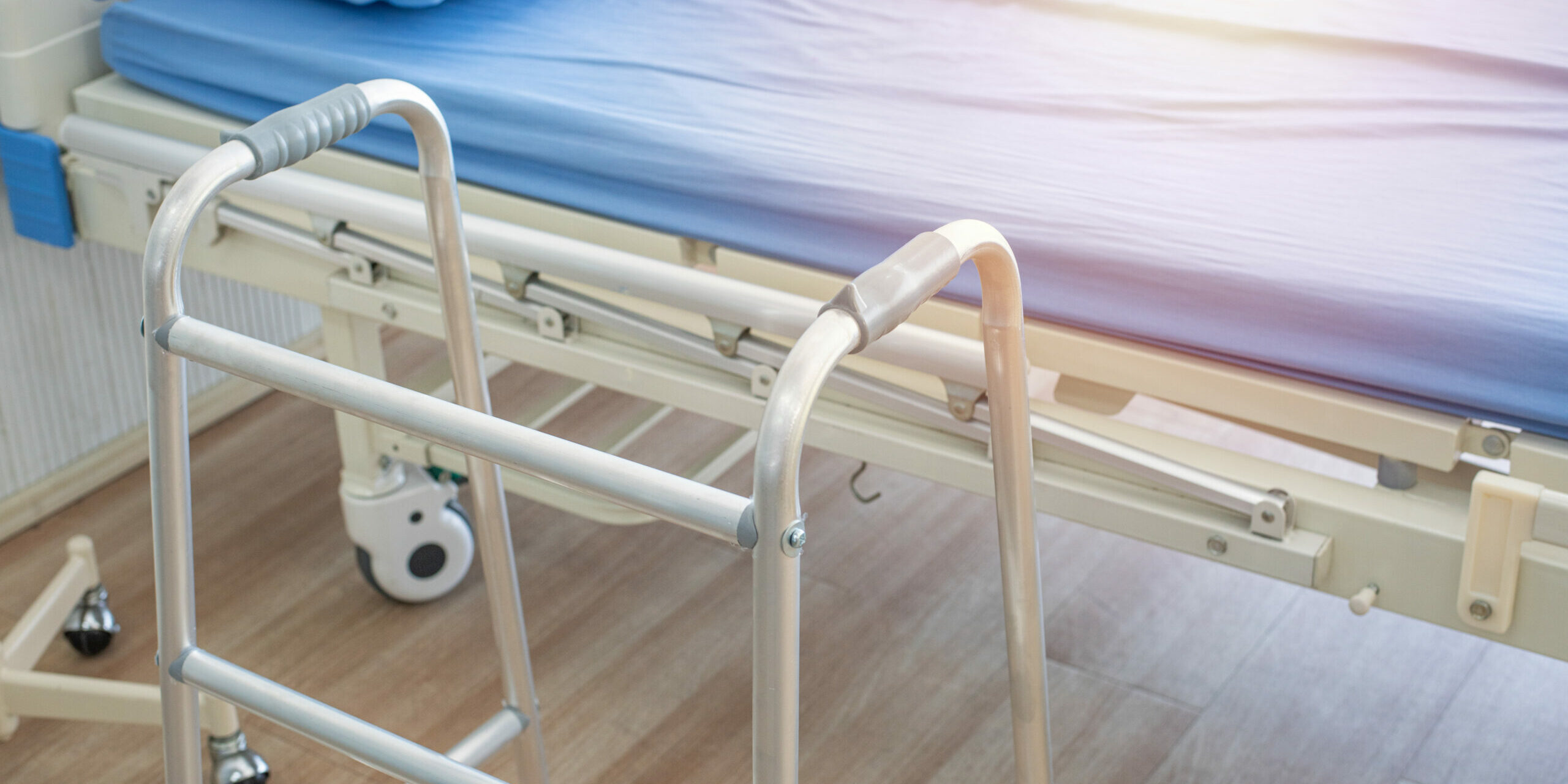 crutches,bed and mobility aids in ward of hospital.